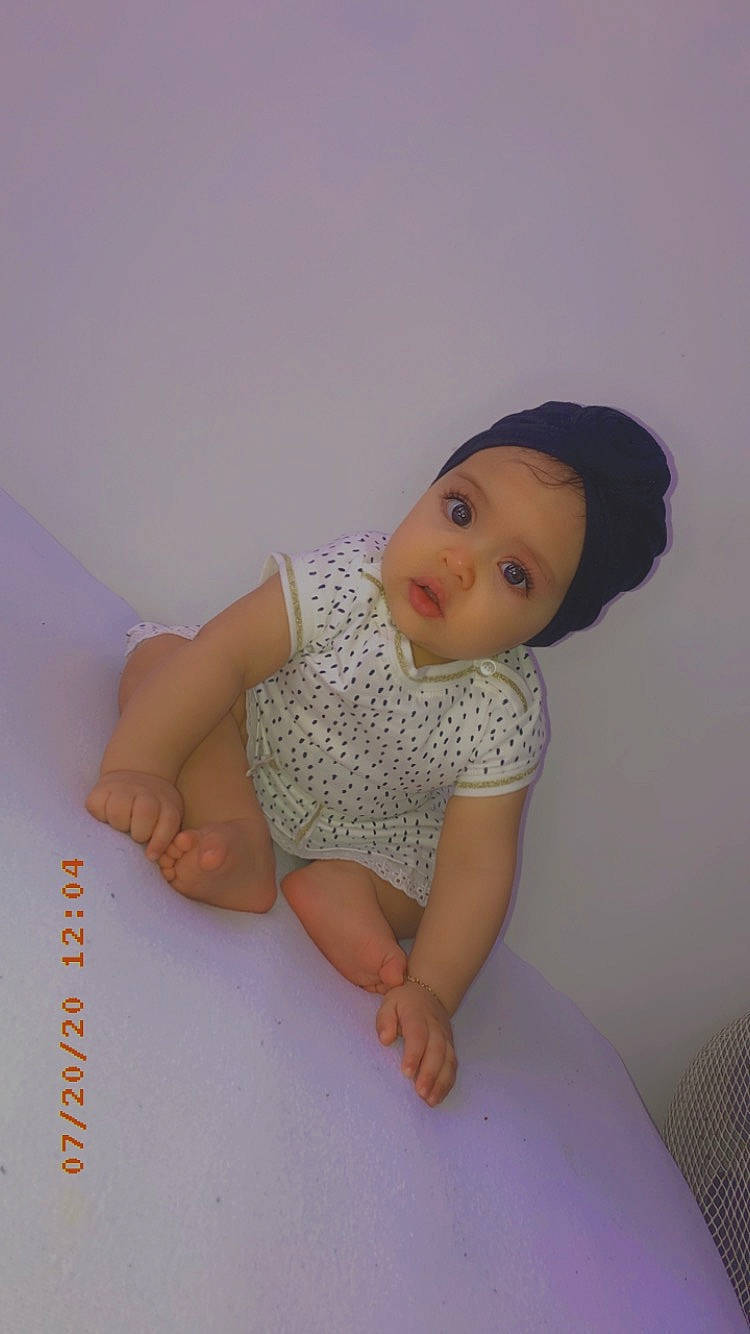 Esraa a rejoint le concours — aidez-le/la à gagner de superbes lots ! baby, baby_toddler_clothing, child, headwear, person, skin, toddler