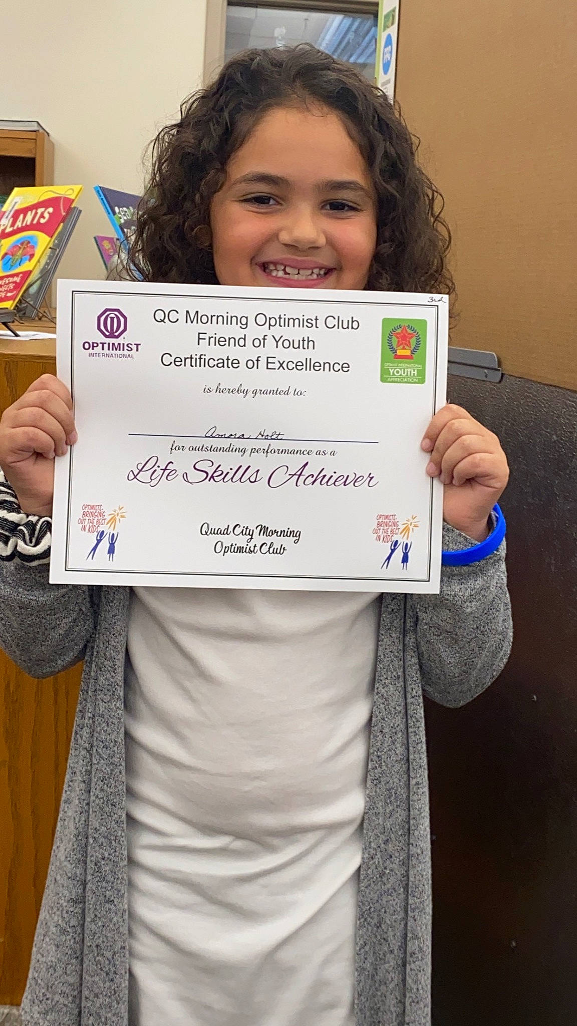 Amora joined the competition — help win amazing prizes! academic_certificate, child, dress, event, font, formal_wear, gesture, handwriting, happy, joy, office_supplies, pattern, person, product, room, sleeve, smile, t_shirt, toddler, writing