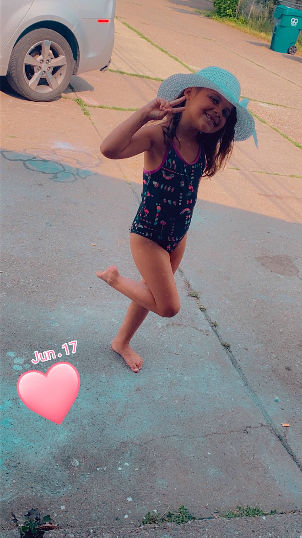 Harper is registered to the contest to win money with this photo: automotive_tire, barefoot, electric_blue, entertainment, floor, flooring, foot, fun, happy, headwear, human_leg, joy, leisure, light, magenta, person, recreation, sportswear, sun_hat, thigh