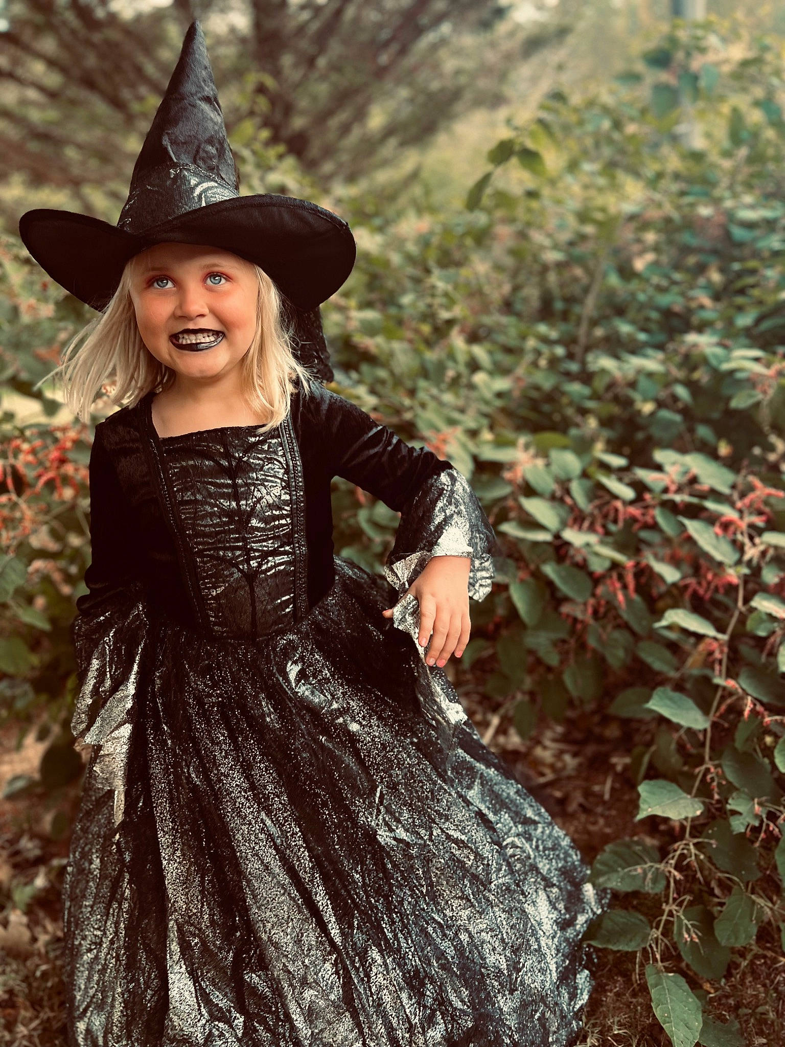 Jacqueline is registered to the contest to win money with this photo: child, day_dress, dress, fashion_accessory, flash_photography, forest, formal_wear, grass, happy, hat, headgear, headwear, joy, leaf, long_hair, one_piece_garment, people_in_nature, person, plant, smile