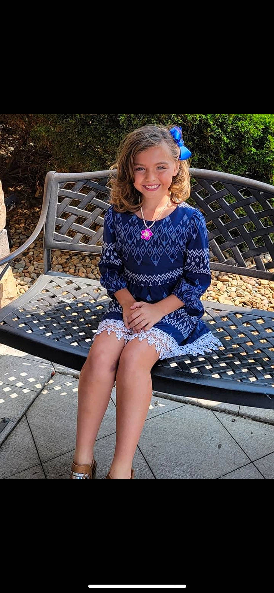 Blaire is registered to the contest to win money with this photo: bench, denim, dress, electric_blue, face, flash_photography, grass, happy, joy, knee, leisure, long_hair, pattern, people_in_nature, person, plant, smile, sunlight, textile, thigh