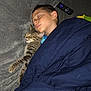 blanket, boy, cat, child, comfort, couch, cozy, domestic, home, indoor, nap, peaceful, pet, relaxation, remote_control, rest, sleeping, snuggling, soft, tabby_cat