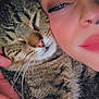 Reginald joined the competition — help win amazing prizes! affection, cat, close_up, cozy, eyeliner, eyes_closed, face, fur, hand, indoor, makeup, nose_piercing, person, portrait, relaxation, skin, snuggling, soft_light, tabby_cat, whiskers