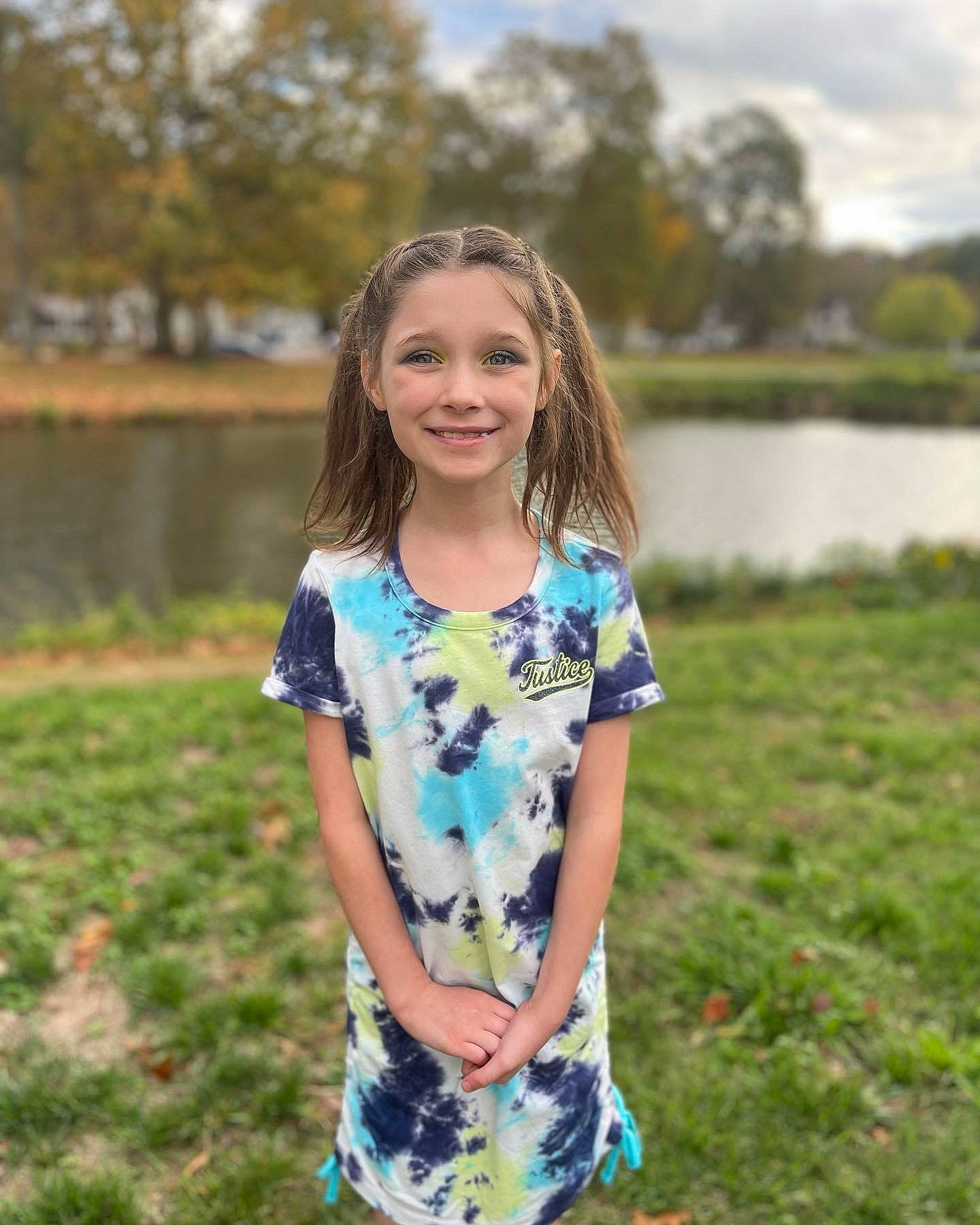 Skye is registered to the contest to win money with this photo: blond, child, day_dress, electric_blue, fun, grass, grassland, happy, joy, leisure, long_hair, meadow, nature, people_in_nature, person, plant, sky, sleeve, smile, summer