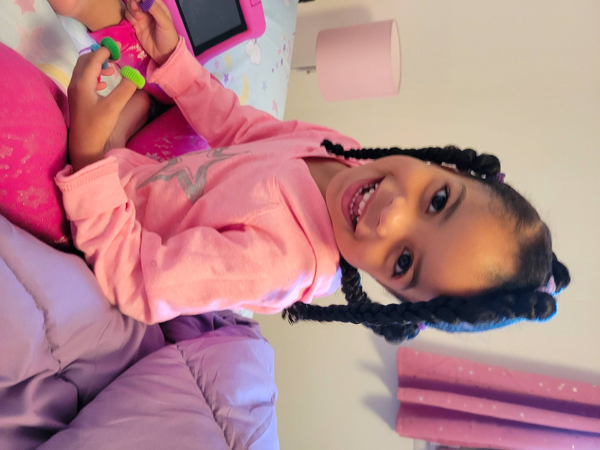 Brielle is registered to the contest to win money with this photo: abdomen, arm, black_hair, child, communication_device, eyelash, fashion_design, fun, happy, human_leg, joint, joy, leisure, magenta, mouth, nail, person, pink, skin, smile
