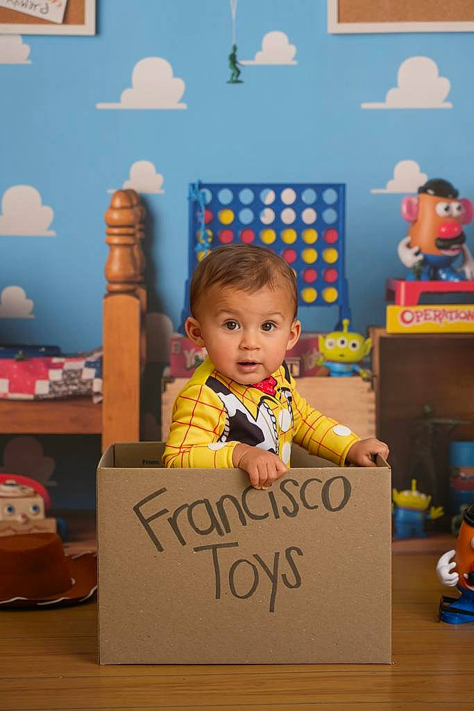 Francisco is registered to the contest to win money with this photo: baby, box, cardboard, child, event, flooring, fun, handwriting, happy, illustration, kindergarten, person, play, room, school, shelving, sitting, surprise, toddler, toy