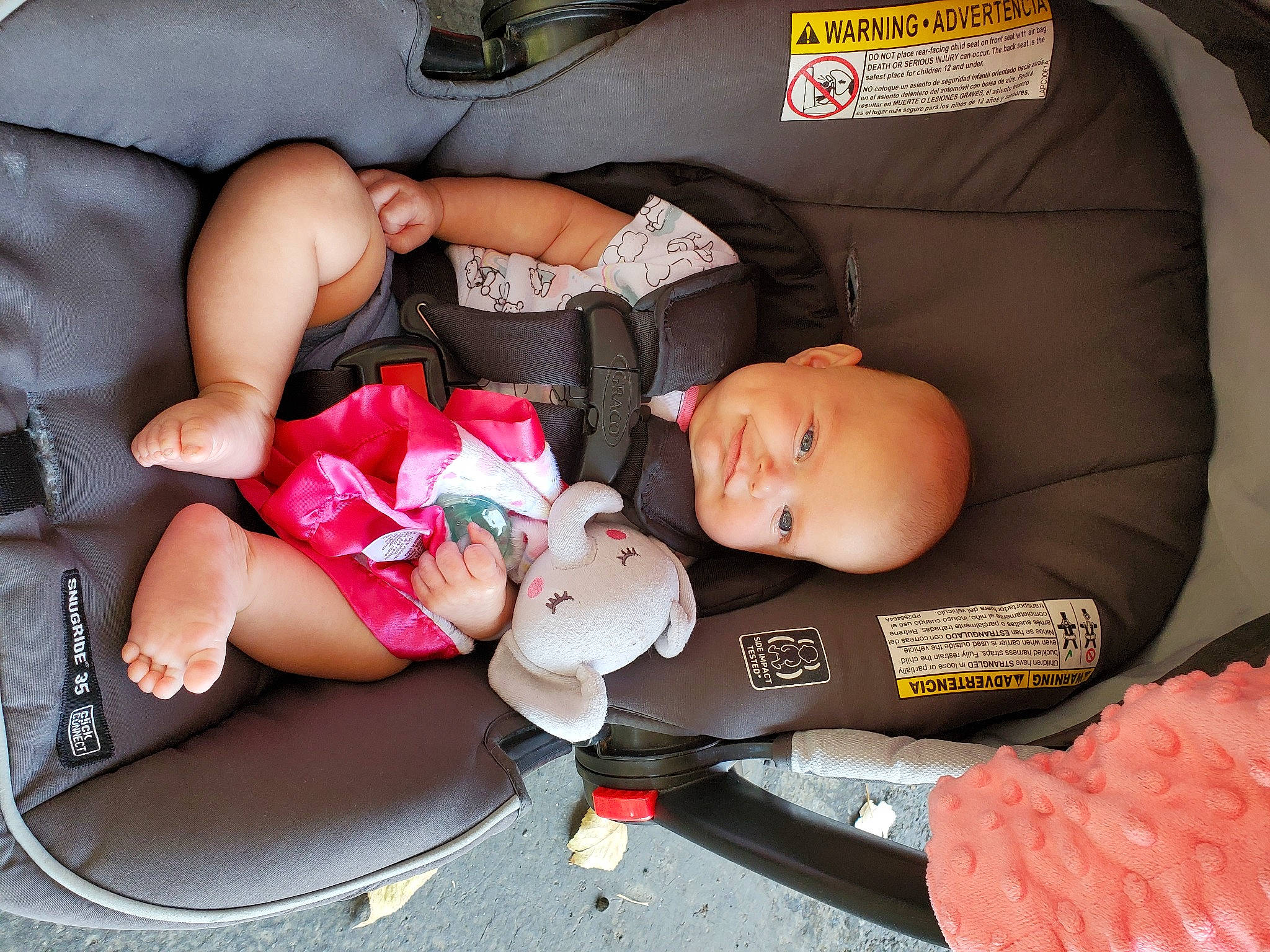 Mandee is registered to the contest to win money with this photo: auto_part, baby, baby_carriage, baby_products, baby_toddler_clothing, car_seat, child, comfort, finger, fun, human_body, human_leg, lap, leg, mouth, person, product, sitting, smile, thigh