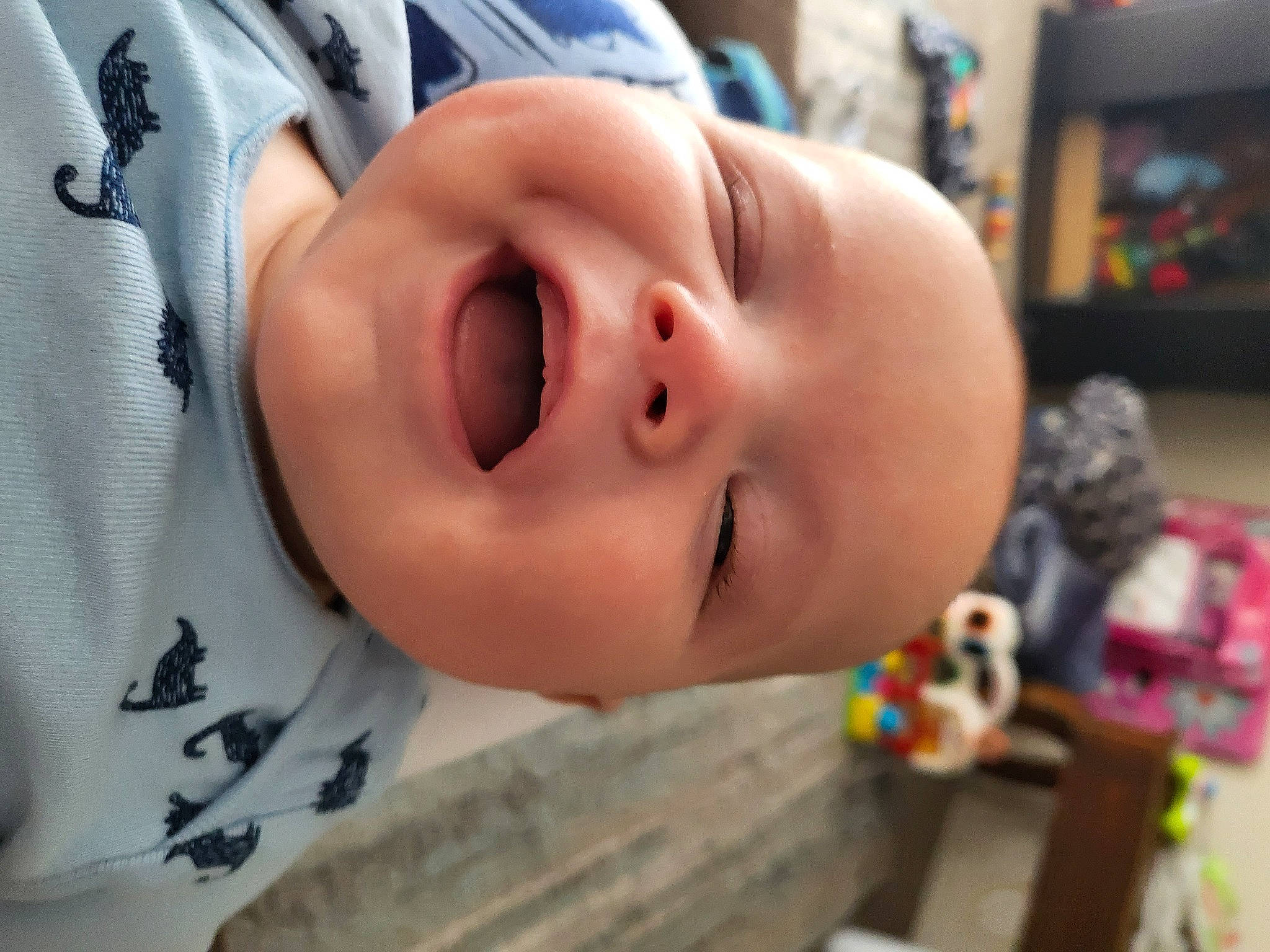 Hyrum is registered to the contest to win money with this photo: baby, baby_products, baby_toddler_clothing, cheek, child, eyelash, fun, happy, hat, iris, lip, nose, person, personal_protective_equipment, photography, shelf, skin, smile, toddler, toy