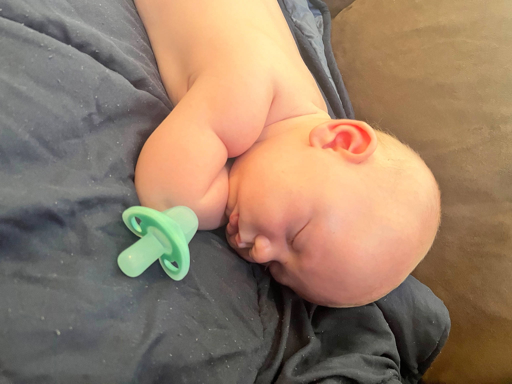 Tyler is registered to the contest to win money with this photo: baby, chest, comfort, ear, eyebrow, finger, gesture, glasses, hair, happy, head, human_body, lip, mouth, nail, neck, nose, person, stomach, thumb