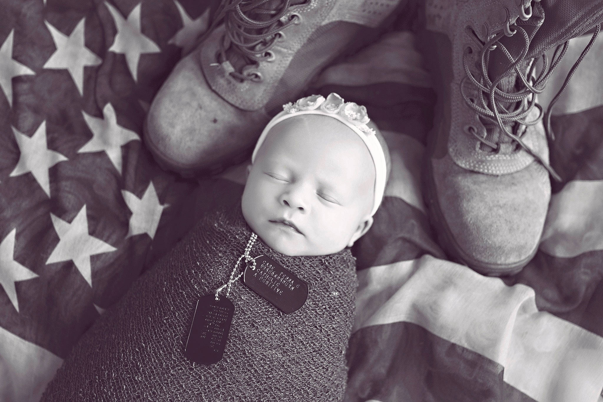 Jenny is registered to the contest to win money with this photo: baby, black_and_white, child, fashion_accessory, hair_accessory, hand, headpiece, monochrome, monochrome_photography, person, photograph, photography, portrait, smile, snapshot, stock_photography, style, toddler