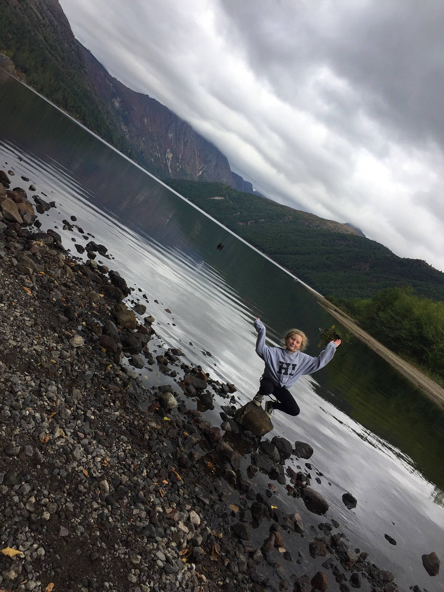 Jaelyn is registered to the contest to win money with this photo: adventure, cloud, coast, fell, geological_phenomenon, highland, hill, joy, lake, landscape, loch, mountain, person, recreation, river, rock, sky, terrain, vacation, water