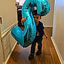 Zion Wesley joined the competition — help win amazing prizes! child, balloon, number_three, hallway, wooden_floor, painting, indoor, door, lamp, living_room, young_child, blue_balloon, toy, person, clothing, footwear, home, decor, flooring, walking