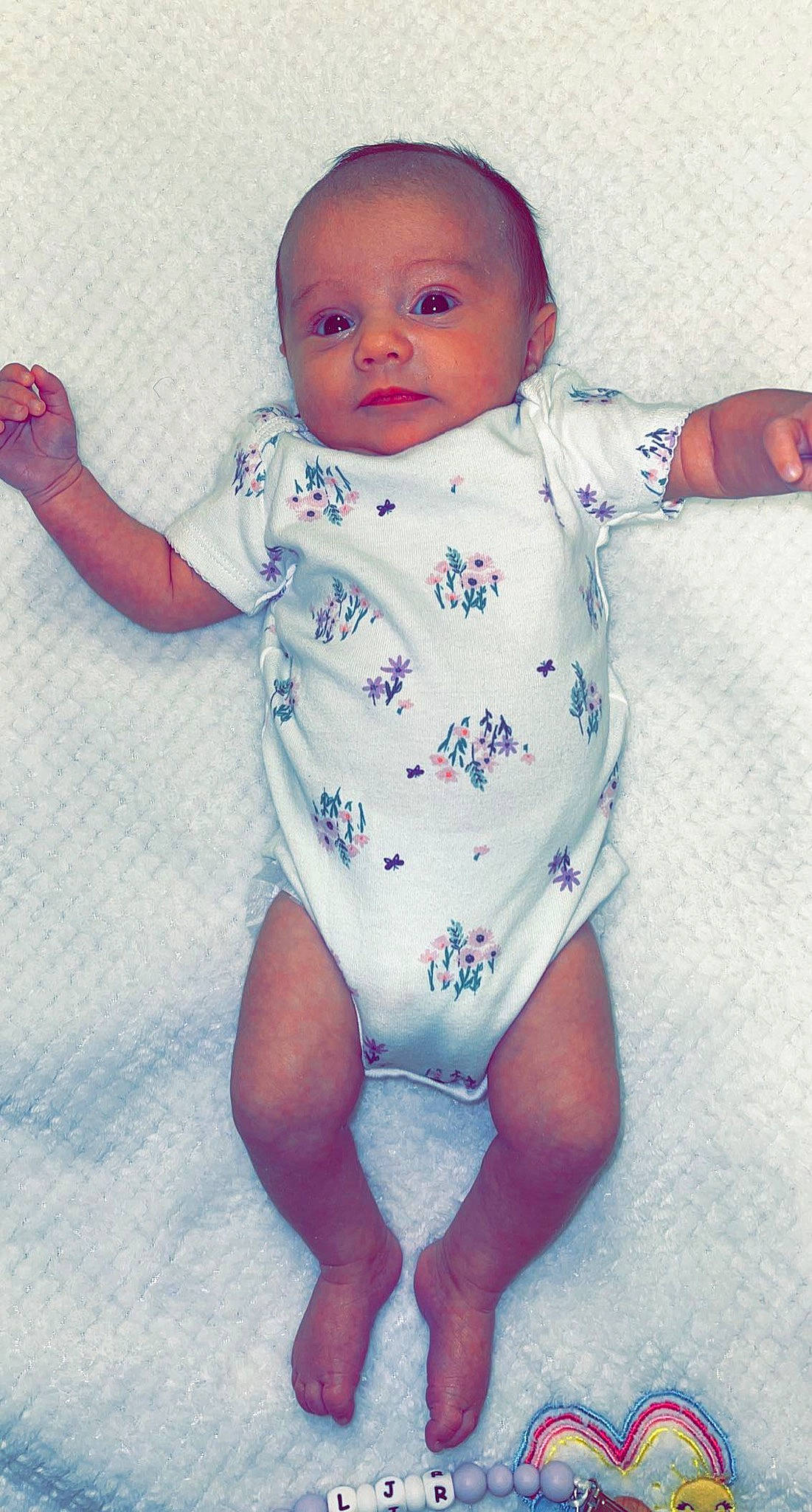 Liza joined the competition — help win amazing prizes! baby, baby_toddler_clothing, barefoot, child, collar, electric_blue, eye, finger, fun, gesture, hand, happy, infant_bodysuit, iris, pattern, person, skin, sleeve, stomach, thumb