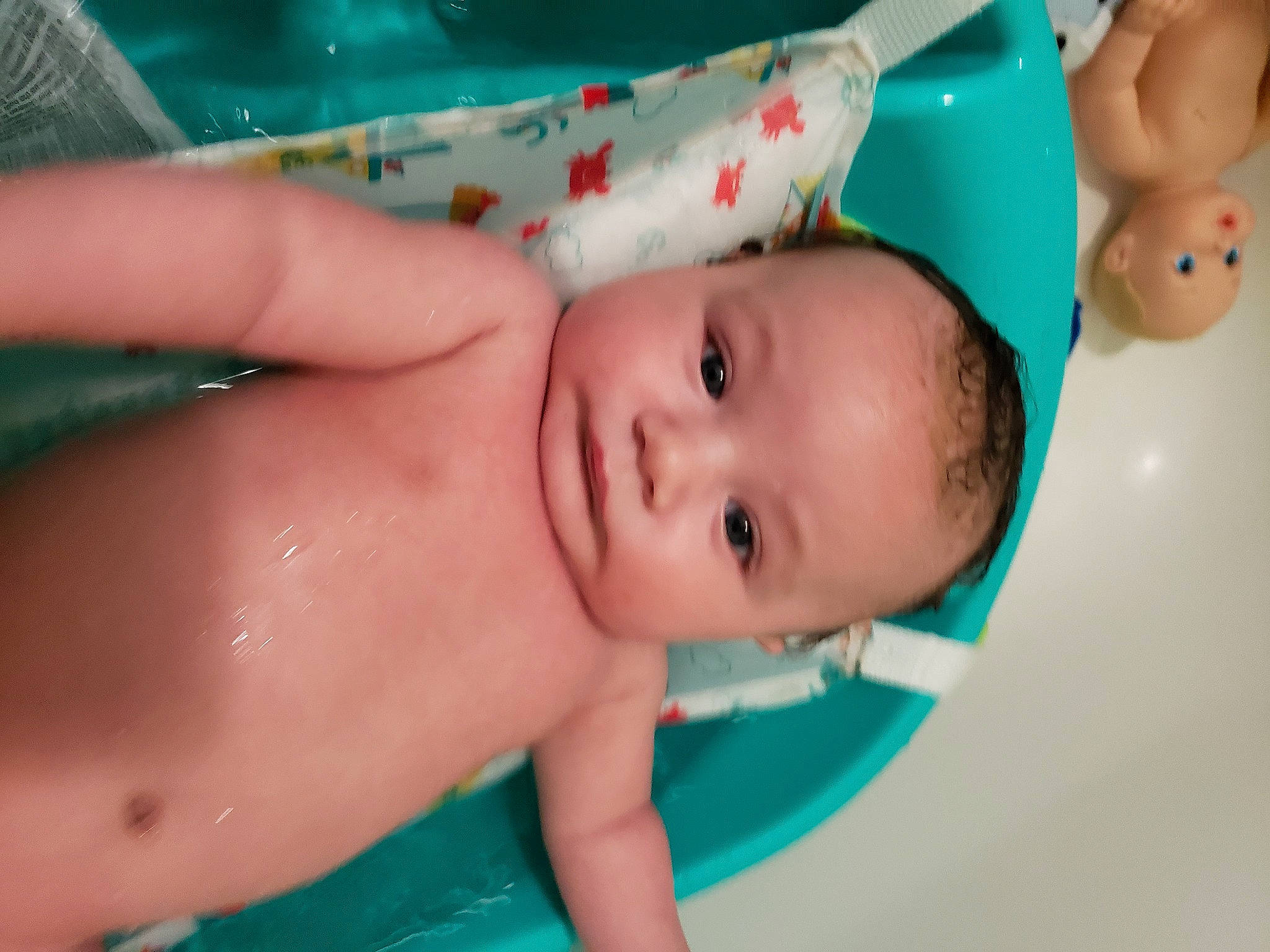 Erik is registered to the contest to win money with this photo: aqua, baby, bathing, blue, cheek, chest, eye, eyebrow, face, finger, fun, happy, head, human_body, iris, mouth, nose, person, skin, stomach
