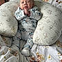 baby, bed, blanket, bodypart, couch, crib, cushion, face, finger, furniture, hand, happy, head, homedecor, infantbed, newborn, person, photography, pillow, portrait