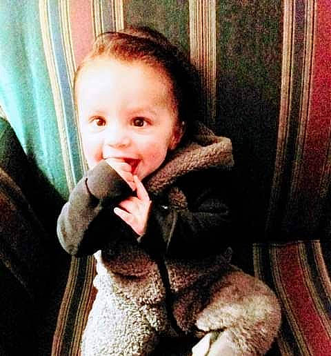 Karma is registered to the contest to win money with this photo: baby, baby_toddler_clothing, cheek, comfort, cool, dress, eye, facial_expression, gesture, happy, head, iris, lip, mammal, nose, person, skin, sleeve, smile, toddler