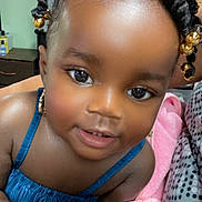 Londyn is registered to the contest to win money with this photo: accessories, blackhair, can, child, clothing, dress, earring, face, female, girl, hair, happy, head, jewelry, person, photography, portrait, purple, smile, tin