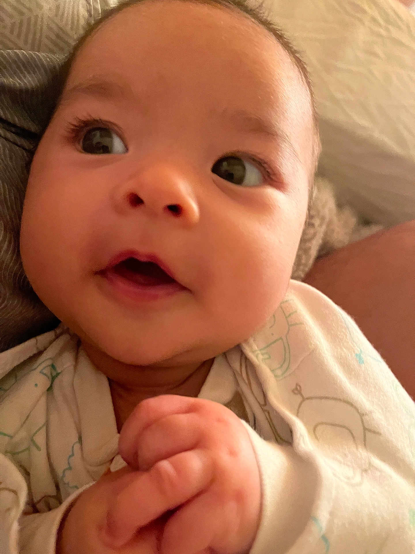 Ella joined the competition — help win amazing prizes! baby, infant, close_up, face, hands, curious, chubby_cheeks, skin, eyes, clothing, cozy, indoor, portrait, cute, expression, newborn, child, person, warm, soft_light