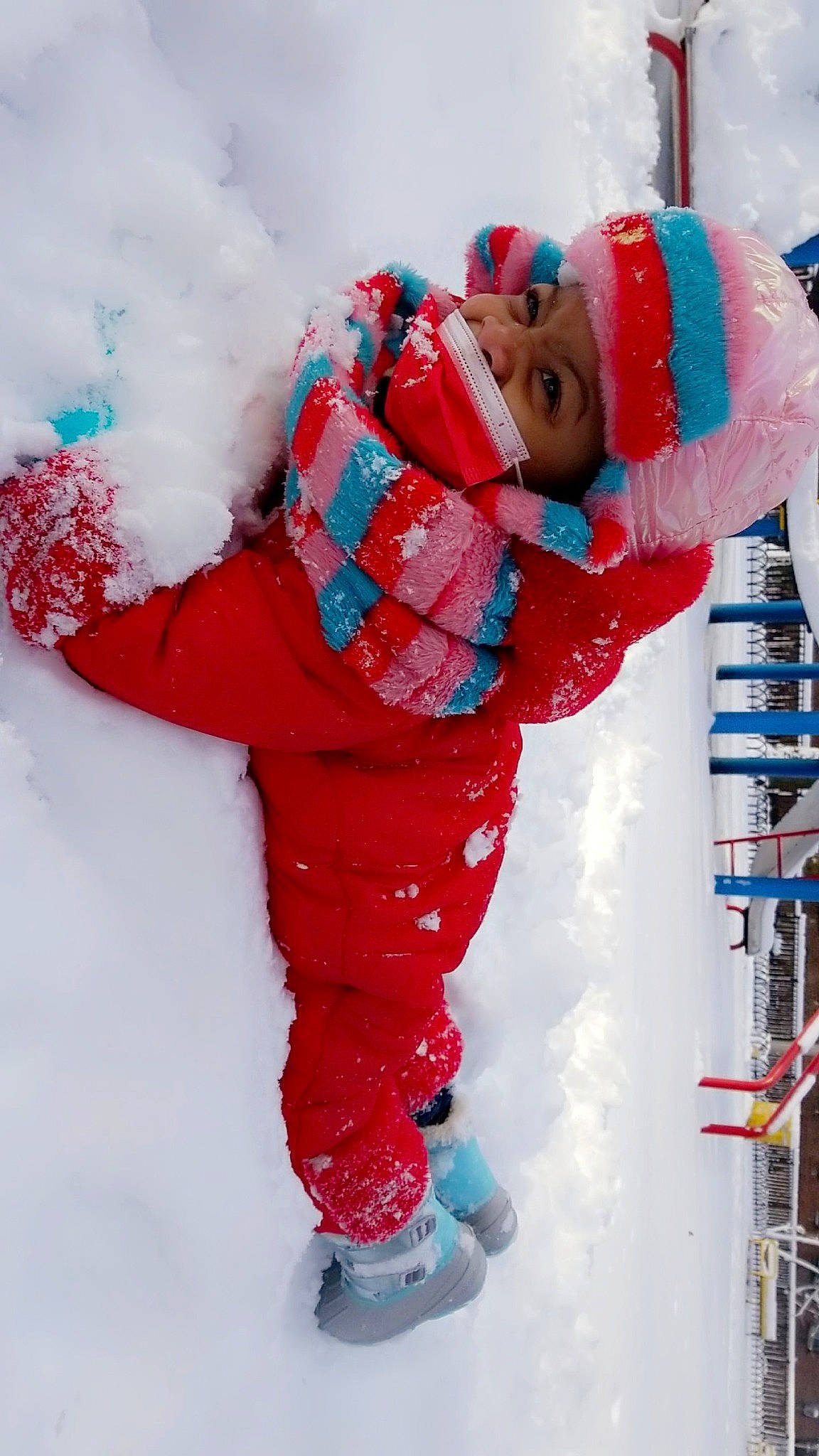 Camiya is registered to the contest to win money with this photo: baby_toddler_clothing, carmine, child, electric_blue, event, fictional_character, freezing, fun, happy, hat, headwear, pattern, person, play, playing_in_the_snow, recreation, red, sleeve, smile, snow