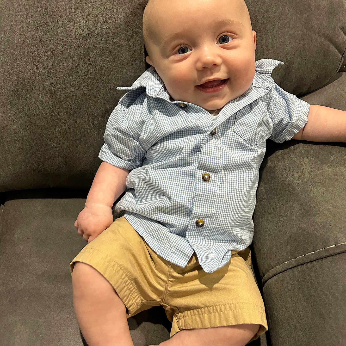 Brayden is registered to the contest to win money with this photo: baby, babylaughing, blonde, clothing, couch, face, furniture, happy, head, jeans, pants, person, photography, portrait, shirt, shorts, sitting, sleeve, smile, standing