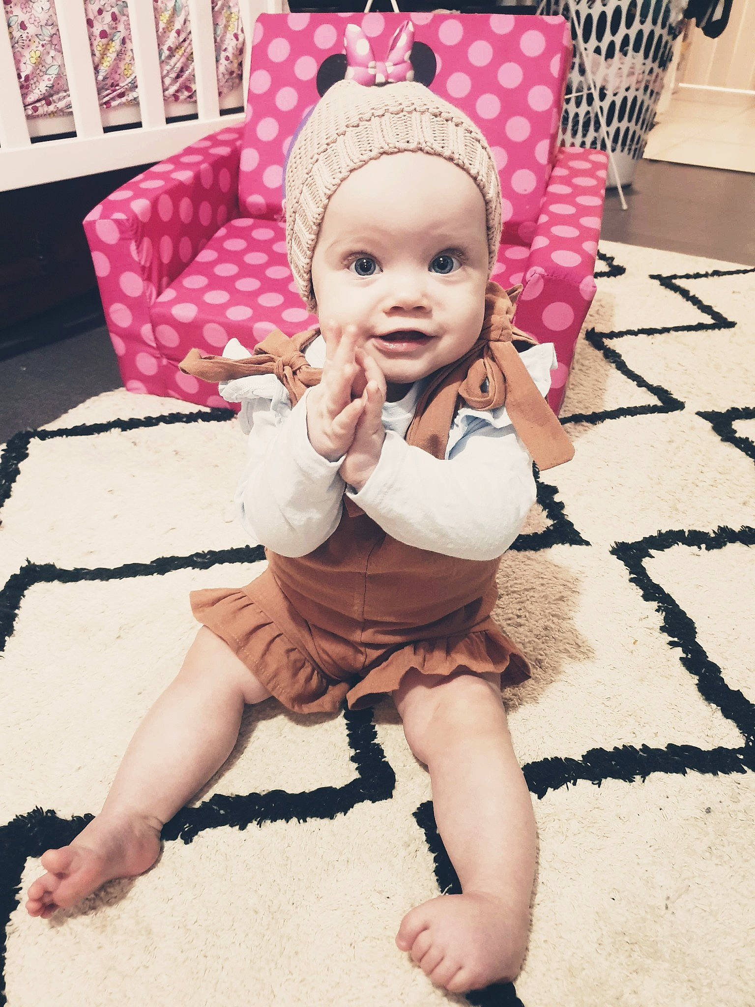 Constance joined the competition — help win amazing prizes! baby, baby_toddler_clothing, cap, cheek, child, cool, ear, eye, fashion_accessory, happy, head, headgear, leg, lip, pattern, person, pink, sitting, skin, smile