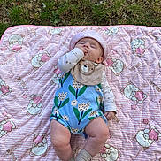 Eliora joined the competition — help win amazing prizes! baby, blanket, outdoor, grass, toddler, child, sleeping, hat, socks, pattern, cute, hand, lying_down, peaceful, nature, floral, pink, teddy_bear, apparel, infant