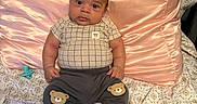 Alexander joined the competition — help win amazing prizes! baby, bed, blanket, boots, child, clothing, cozy, cute, drool, expression, fabric, face, indoors, infant, pants, pattern, person, pillow, sitting, soft