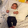 Alexander joined the competition — help win amazing prizes! baby, blanket, clothing, cute, dark_pants, fabric, face, feet, hands, head, indoor, infant, lemon_slice_pillow, lying_down, pattern, pillow, portrait, smile, striped_shirt, young_child