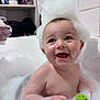baby, bath, bathroom, bubble_crown, bubbles, child, cute, foam, hand, happy, head, infant, playful, sitting, skin, smiling, star_shaped_toy, tile_wall, toy, water