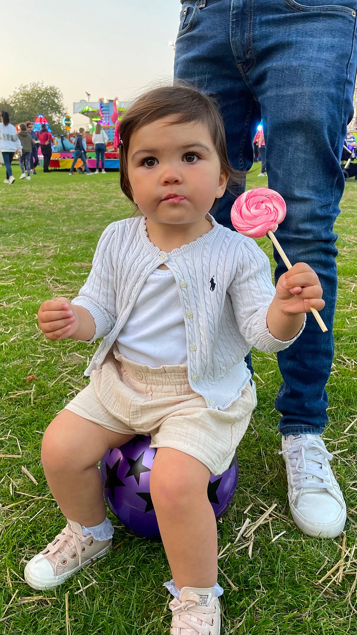 Ava Mae is registered to the contest to win money with this photo: baby_toddler_clothing, blue, child, clothing, finger, fun, grass, happy, lawn, leg, leisure, people_in_nature, person, pink, plant, shoe, shorts, sneakers, summer, toddler