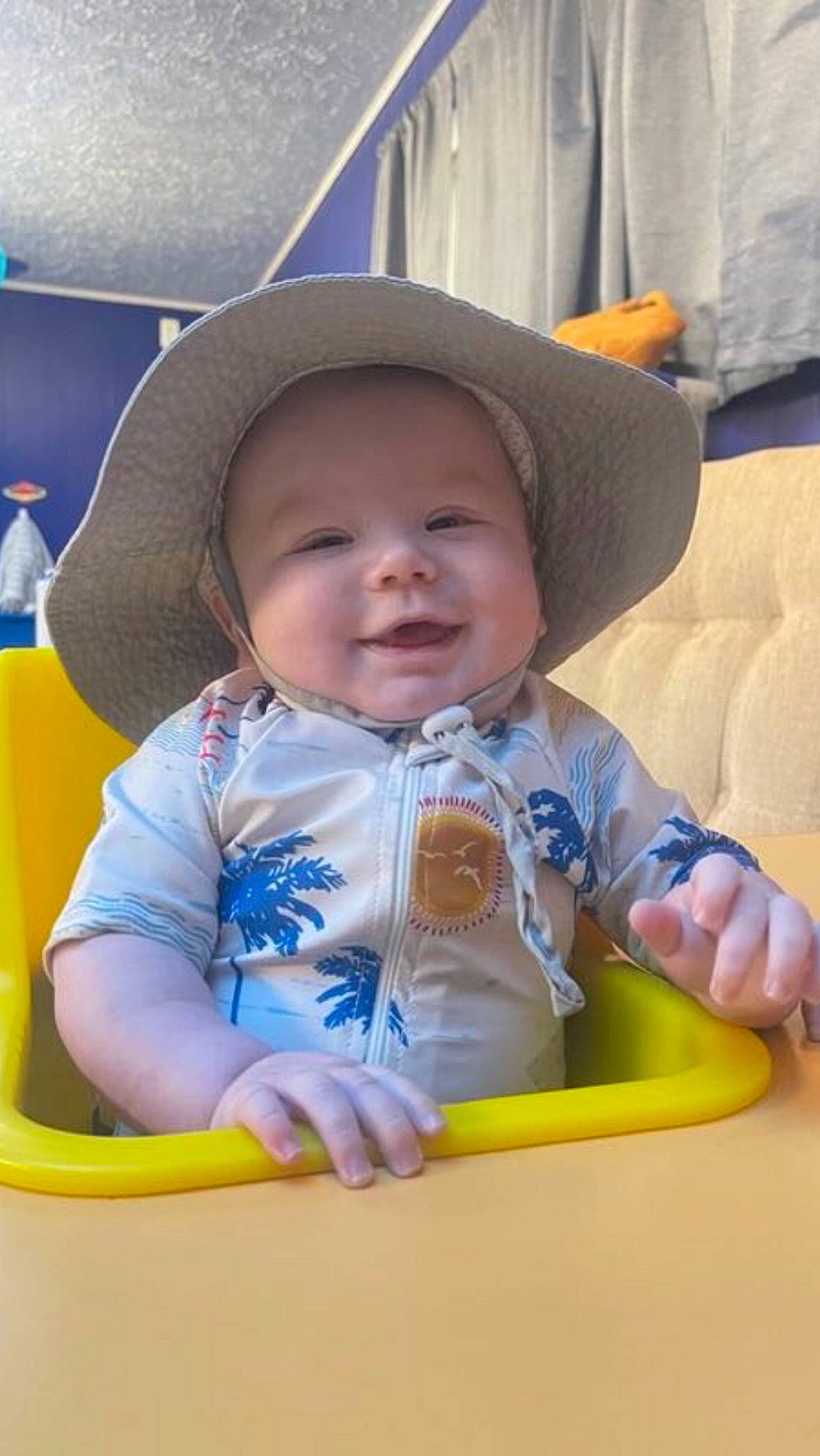 Lux joined the competition — help win amazing prizes! baby, baby_laughing, baby_toddler_clothing, blue, bottle, cheek, child, comfort, electric_blue, fun, happy, hat, headwear, person, plastic_bottle, sitting, skin, smile, sun_hat, toddler
