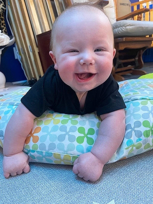 Lux joined the competition — help win amazing prizes! baby, baby_toddler_clothing, chair, child, comfort, curtain, flooring, fun, happy, head, houseplant, linens, pattern, person, room, sitting, skin, sleeve, smile, toddler