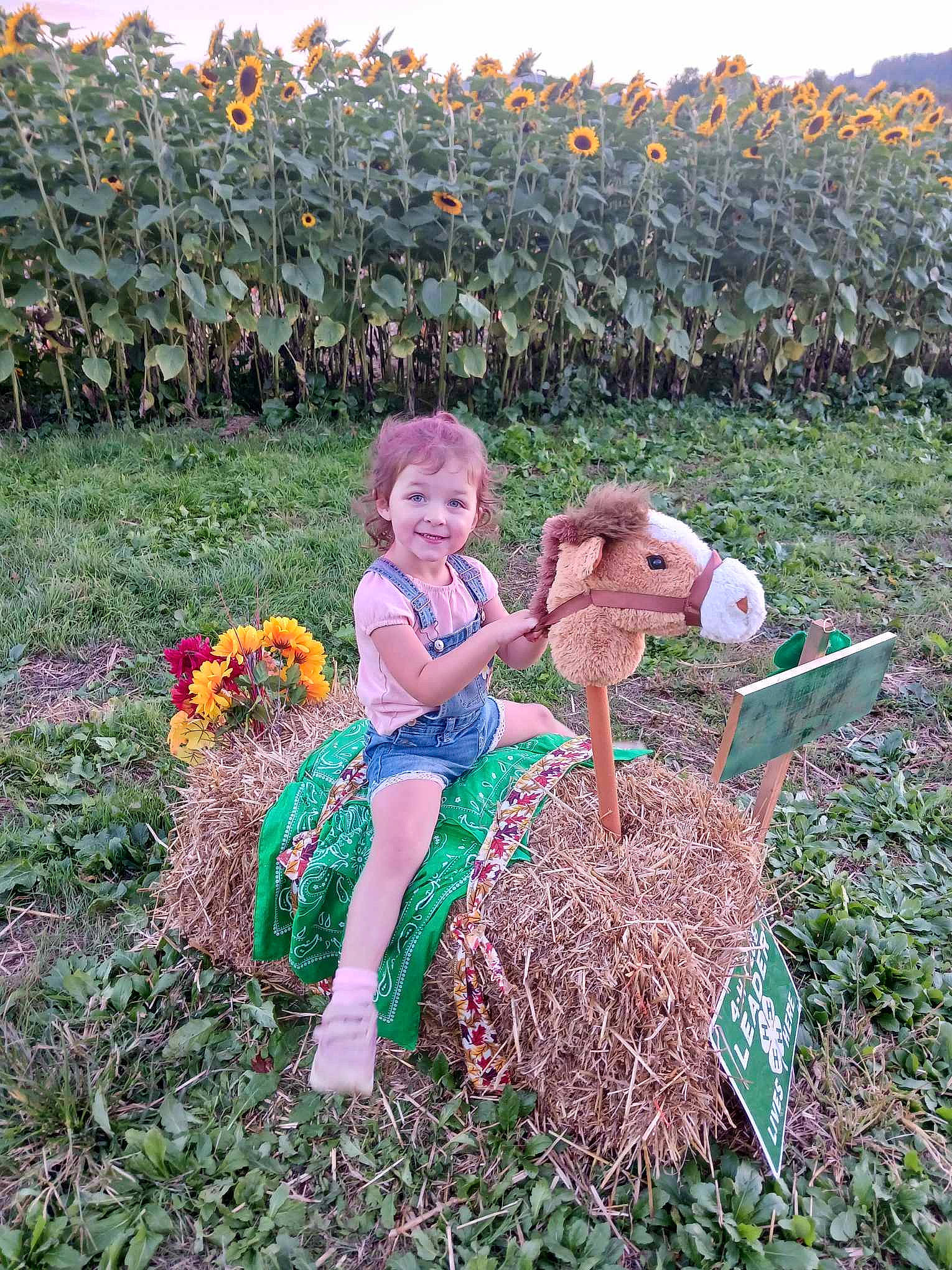 Ember joined the competition — help win amazing prizes! agriculture, annual_plant, calabaza, farmworker, field, flower, flowering_plant, garden, grass, groundcover, happy, hat, joy, people_in_nature, person, plant, plantation, pumpkin, shrub, smile