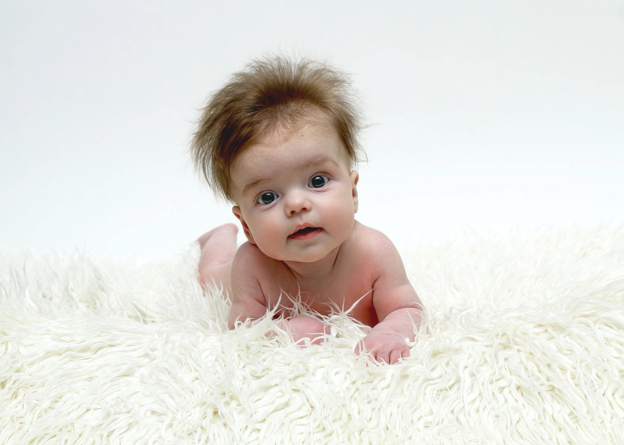 Violet is registered to the contest to win money with this photo: baby, baby_toddler_clothing, cheek, child, comfort, flash_photography, flooring, fun, fur, grass, happy, iris, linens, people_in_nature, person, portrait, portrait_photography, sitting, skin, toddler