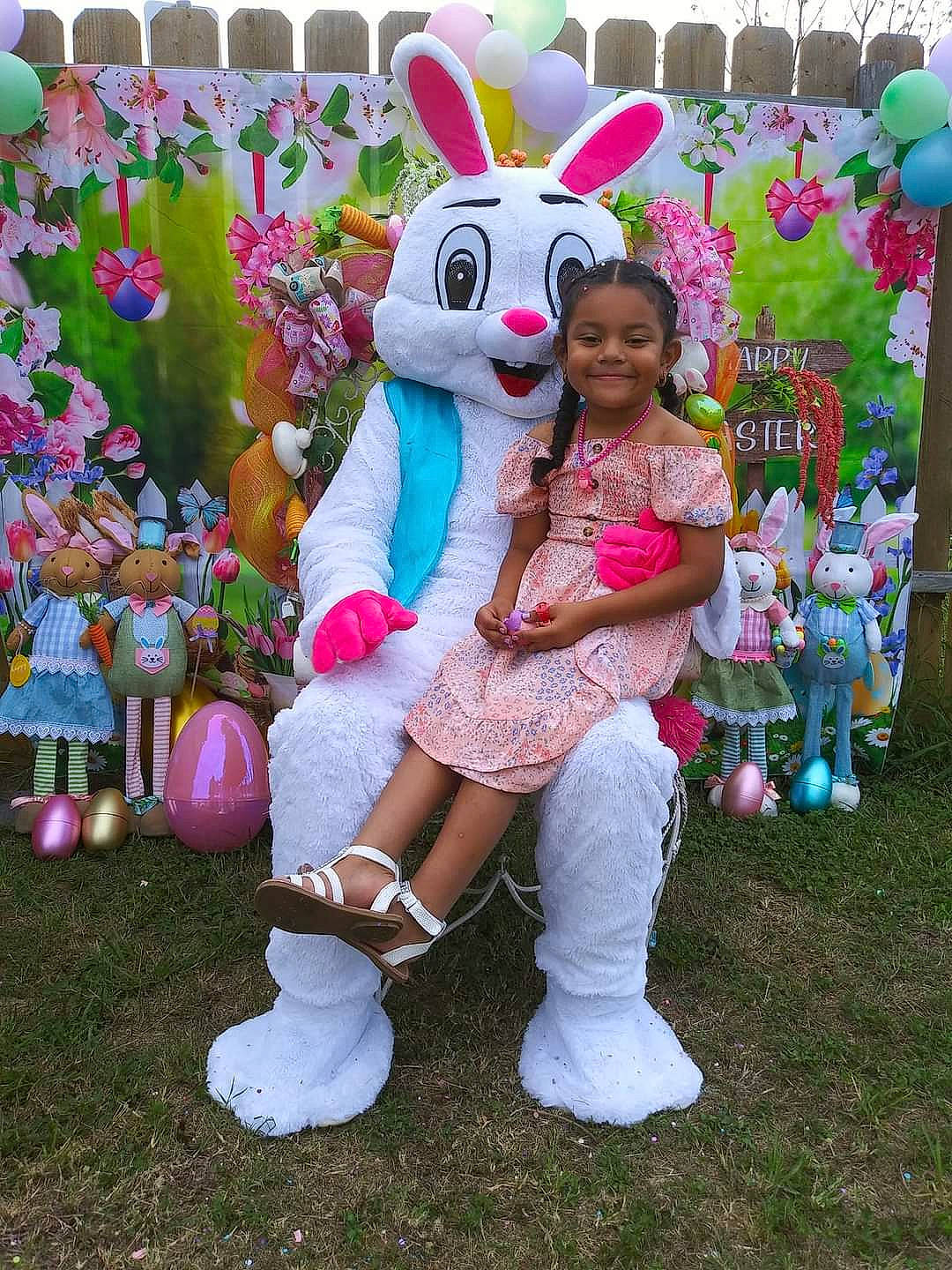 Sapphire is registered to the contest to win money with this photo: child, easter_bunny, event, fun, grass, happy, hat, holiday, joy, leisure, magenta, mammal, people, person, pink, plant, rabbit, recreation, smile, summer