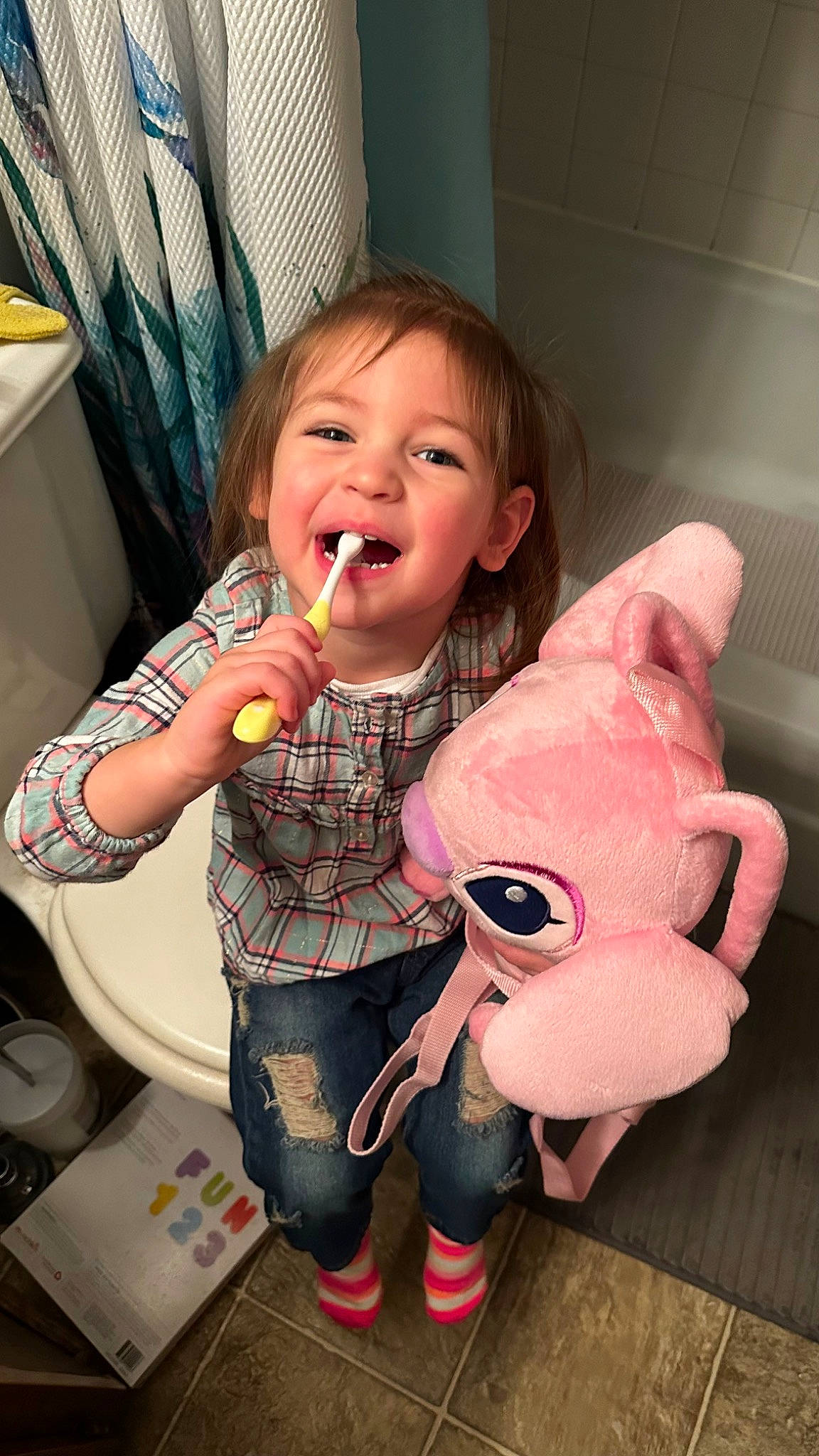Riley Jade is registered to the contest to win money with this photo: baby, baby_products, baby_toddler_clothing, carmine, cheek, child, facial_expression, finger, fun, happy, mouth, person, pink, play, room, sitting, skin, smile, thumb, toddler
