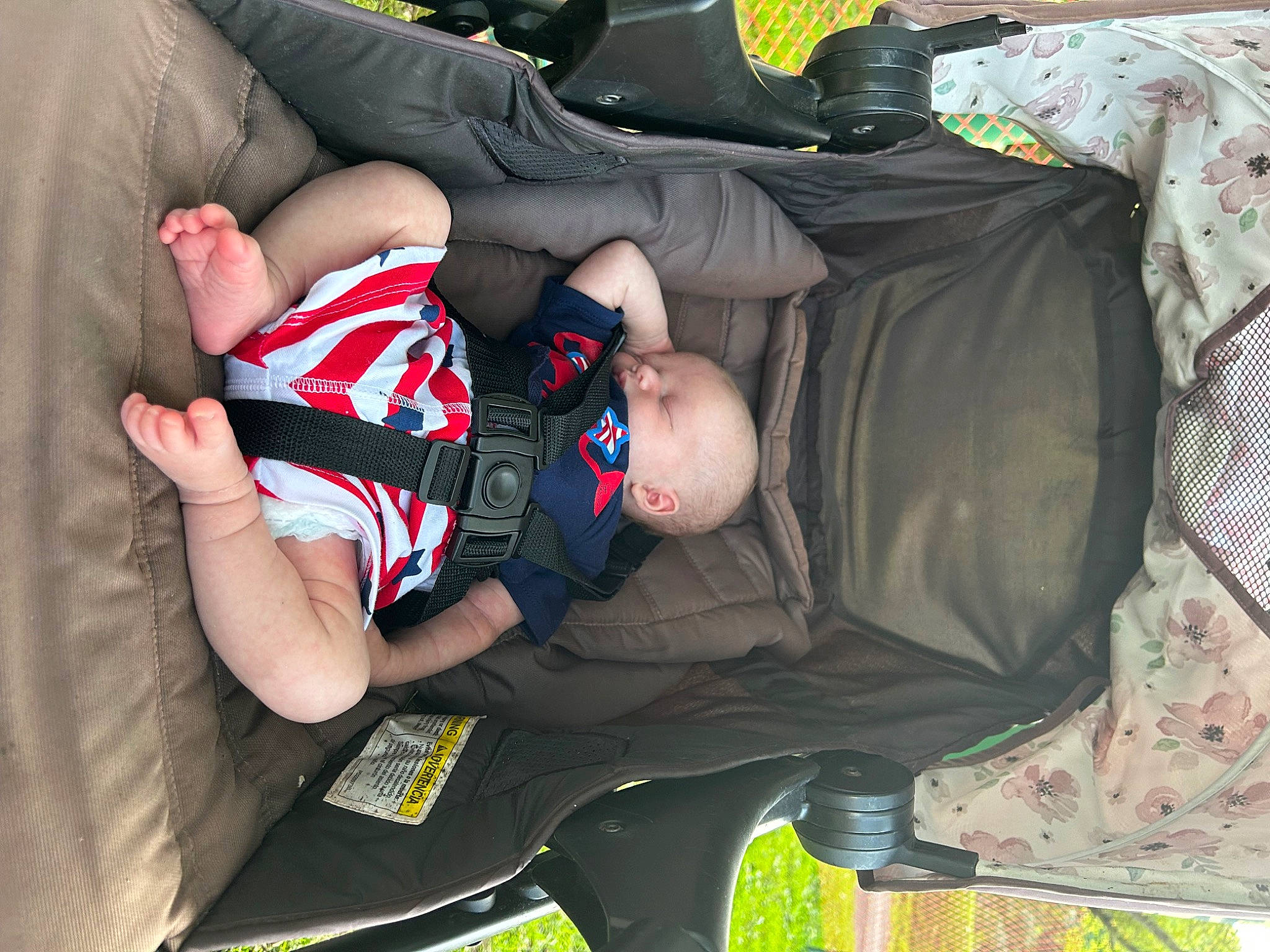 Hudson is registered to the contest to win money with this photo: auto_part, baby, baby_carriage, baby_products, baby_toddler_clothing, bag, carmine, child, comfort, elbow, human_leg, knee, lap, luggage_and_bags, person, personal_protective_equipment, sitting, sleeve, thigh, toddler