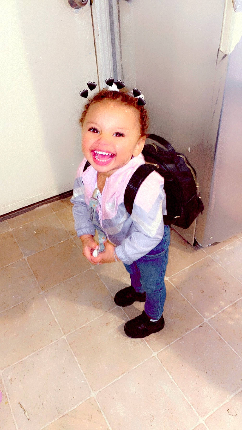 Jennifer is registered to the contest to win money with this photo: baby_toddler_clothing, eyewear, fashion_accessory, fashion_design, flash_photography, floor, flooring, fun, hair, happy, joy, leisure, magenta, pattern, person, play, purple, room, sitting, sleeve