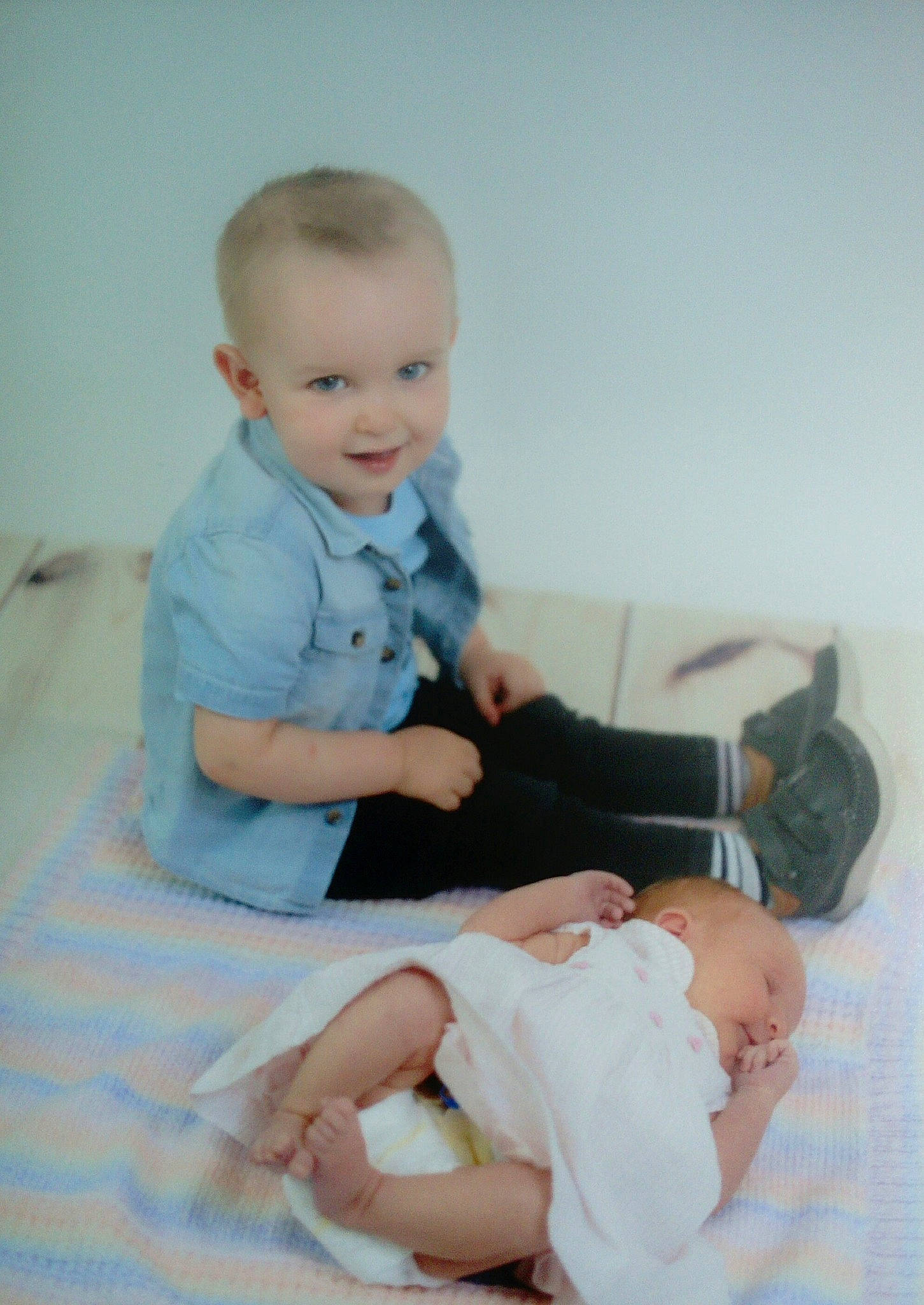 Theo is registered to the contest to win money with this photo: baby, baby_toddler_clothing, child, joy, person, sitting, toddler