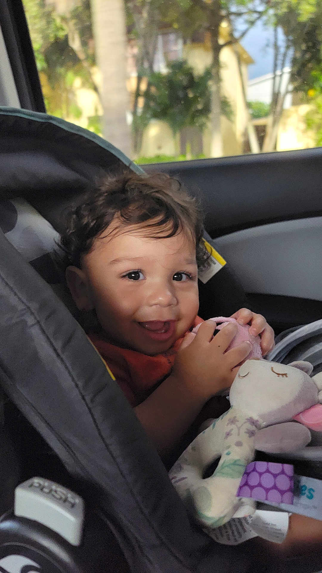 Marcus is registered to the contest to win money with this photo: baby, bodypart, car, car_interior, carseat, clothing, cushion, face, finger, glove, hand, head, homedecor, person, photography, portrait, stroller, toy, transportation, vehicle