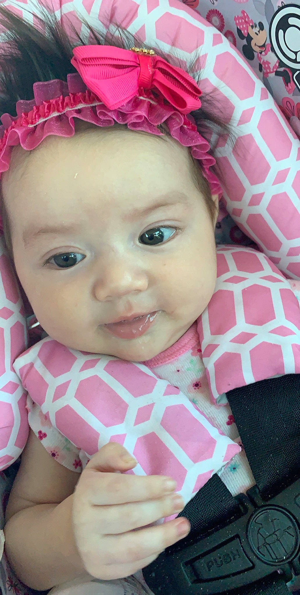 Iliana is registered to the contest to win money with this photo: baby, baby_products, baby_toddler_clothing, cheek, child, face, hair_accessory, head, headband, headgear, lip, person, pink, skin, smile, toddler