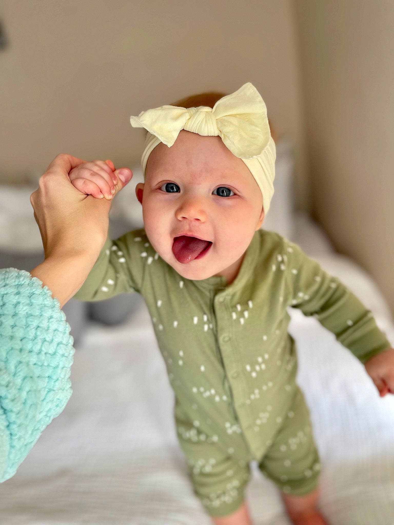 Laila joined the competition — help win amazing prizes! baby, baby_toddler_clothing, cheek, child, comfort, eye, gesture, happy, head, headwear, human_body, iris, linens, nose, pattern, person, product, skin, sleeve, smile