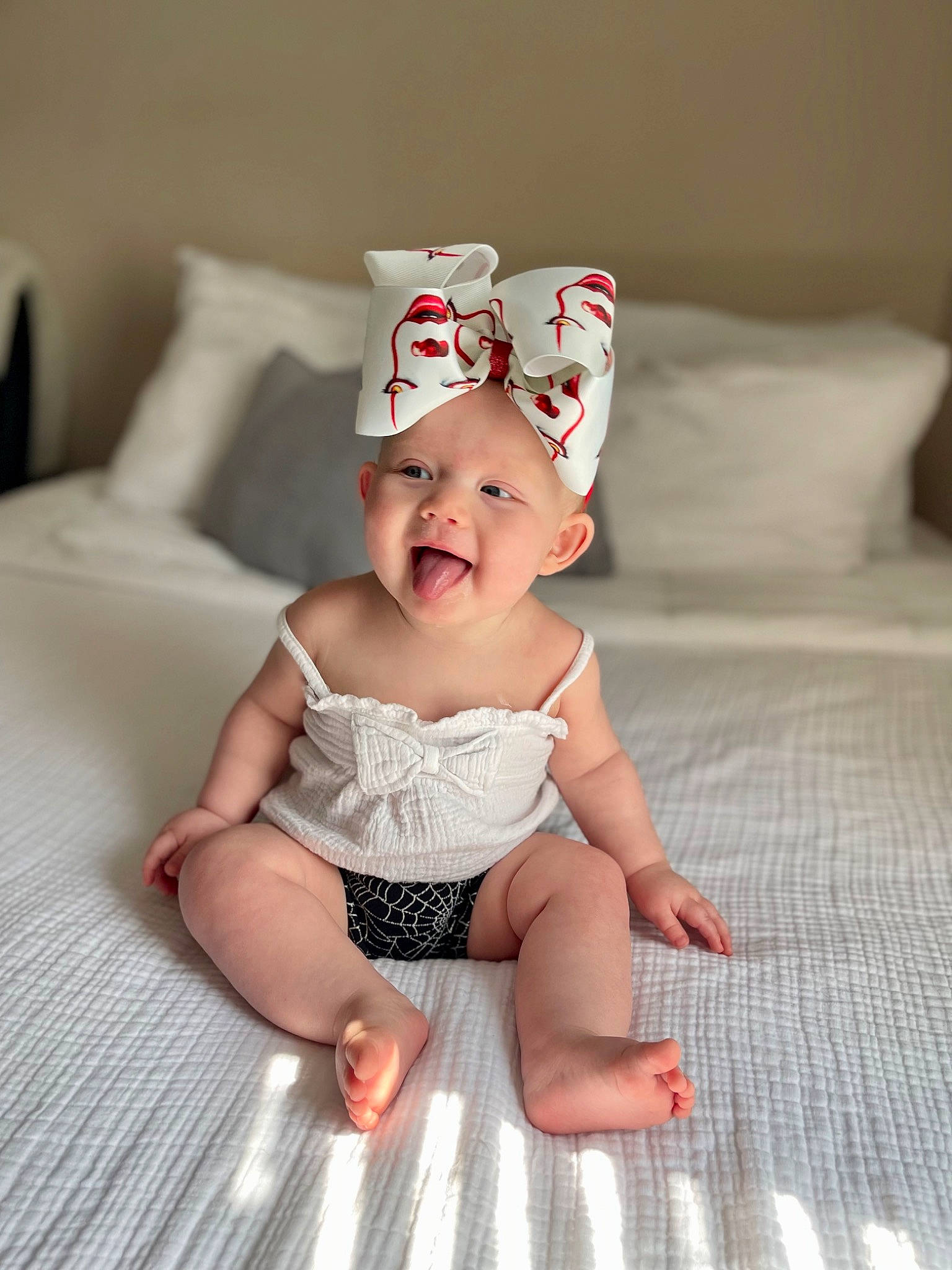 Laila joined the competition — help win amazing prizes! baby, baby_toddler_clothing, cap, child, comfort, costume_hat, fashion_accessory, flash_photography, flooring, fun, happy, headband, headpiece, headwear, pattern, person, sitting, skin, sleeve, smile