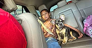 Roscoe joined the competition — help win amazing prizes! girl, child, dog, french_bulldog, pet, car, vehicle, backseat, seatbelt, leather_seats, sitting, companion, indoor, travel, family, portrait, ears, puppy, pink_backpack, daylight