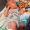 Griffin joined the competition — help win amazing prizes! newborn, baby, pacifier, plush_toy, tiger_toy, blanket, sleeping, infant, clothing, onesie, baby_seat, cute, peaceful, indoors, soft_texture, child, resting, toddler, toy, comfort