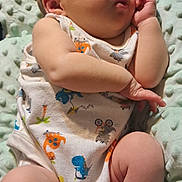 Griffin joined the competition — help win amazing prizes! baby, infant, sleeping, onesie, animal_print, blanket, soft_texture, peaceful, cute, newborn, child, laying_down, skin, hand, foot, relaxation, indoors, portrait, closeup, comfort