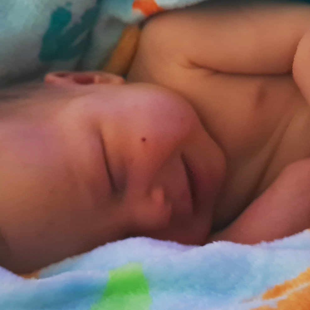 Griffin joined the competition — help win amazing prizes! baby, newborn, sleeping, smiling, blanket, cozy, infant, soft, cute, peaceful, child, wrapped, skin, resting, warm, comfort, portrait, closeup, toddler, happy