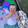 Rosina is registered to the contest to win money with this photo: architecture, baby, beverage, bottle, building, clothing, couch, cushion, face, furniture, head, homedecor, outdoors, person, photography, portrait, shelter, shorts, summer, t_shirt