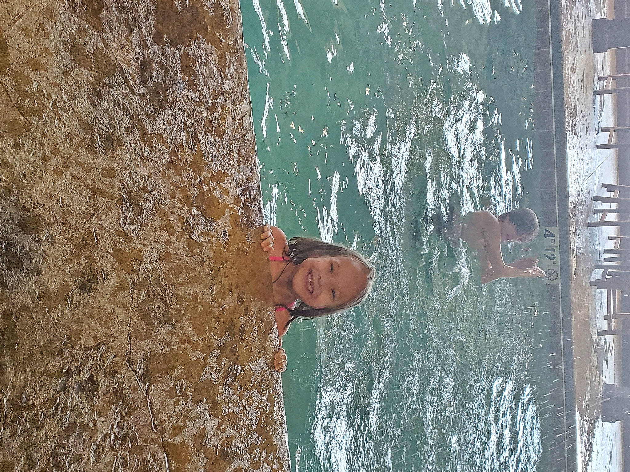 Annmarie is registered to the contest to win money with this photo: azure, beach, coast, concrete, fountain, fun, joy, lake, leisure, ocean, person, recreation, reflection, rock, sea, smile, trunk, vacation, water, wave