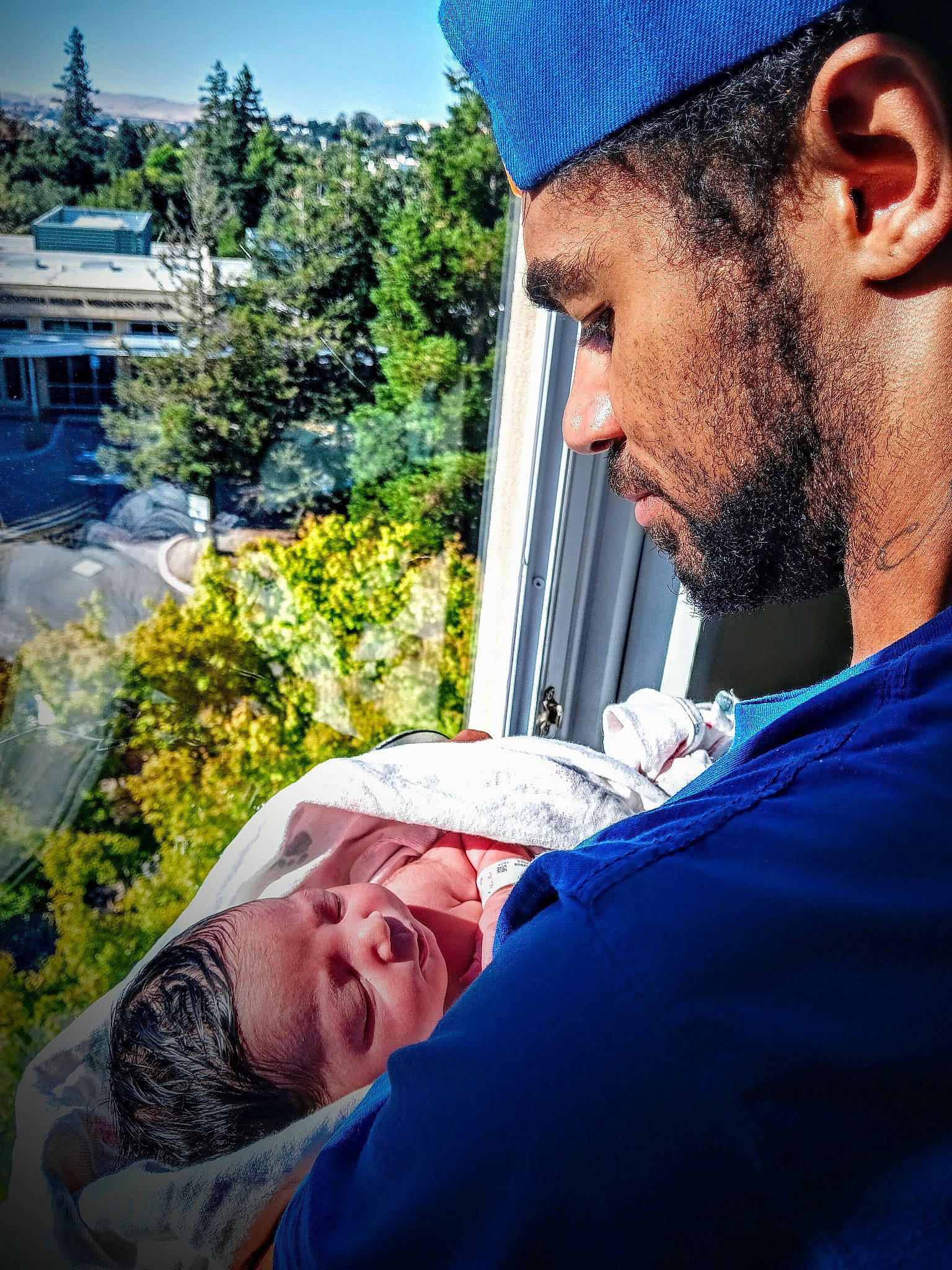 Dominique joined the competition — help win amazing prizes! azure, baseball_cap, beard, blue, cap, chin, cool, daytime, elbow, electric_blue, eyewear, facial_hair, hairstyle, happy, organ, person, photograph, shoulder, sky, t_shirt